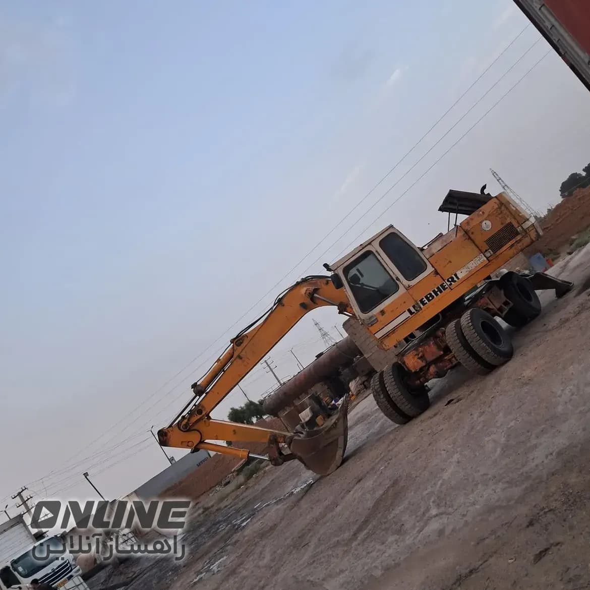 فروش بیل مکانیکی لاستیکی ۹۱۲ — تصویر 1 از 4