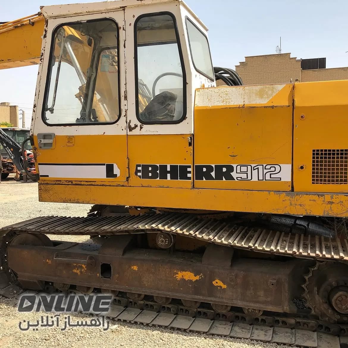 بیل زنجیری هپکو ۹۱۲ بیل زنجیری هپکو ۹۱۲ — تصویر 1 از 7
